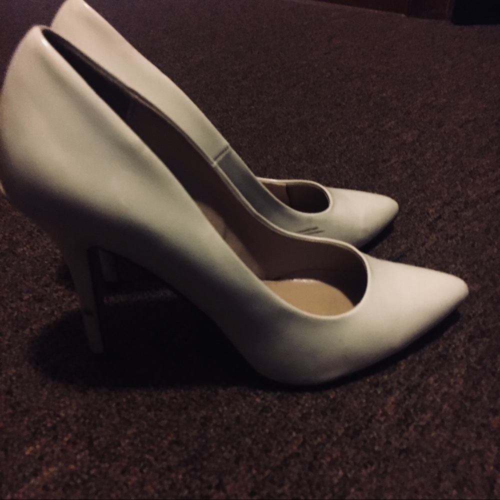 White pointy high heels